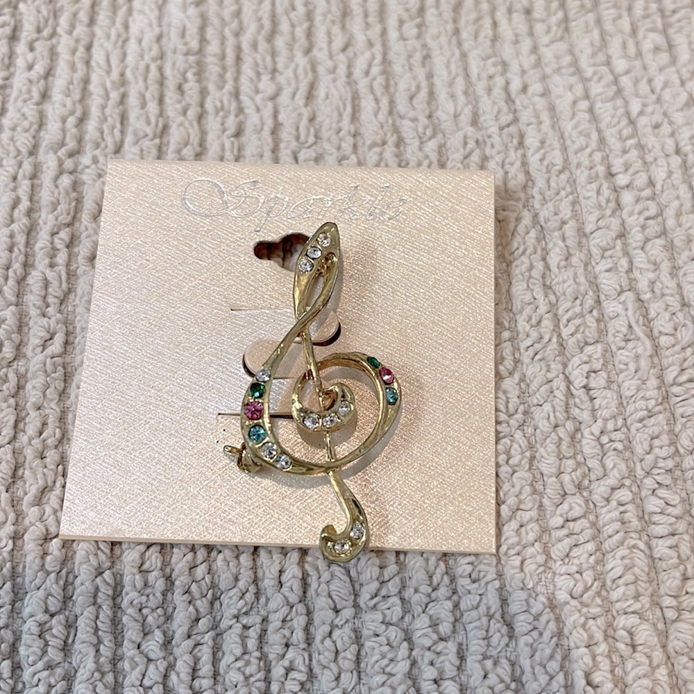 Sparkle Treble Clef pin.
